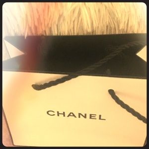 Small Chanel jewelry or fragrance bag.